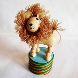 jouet Lion en bois articule